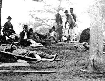 Photo can be located at: http://www.google.com/imgres?imgurl=http://3.bp.blogspot.com/-wCjEj8tEOeM/UVo9M8E8E4I/AAAAAAAAMhg/adyKs5OgEFg/s1600/nded%252520Soldiers%252520Being%252520Tended%252520in%252520the%252520Field%252520After%252520the%252520Battle%252520of%252520Chancellorsville%252520-%252520Near%252520Fredericksburg,%252520VA,%252520May%2525202,%2525201863.jpg&imgrefurl=http://www.ghosting12.com/2013/04/battle-of-chancellorsville-brought.html&h=445&w=551&sz=65&tbnid=LlZShu9hZBn2qM:&tbnh=94&tbnw=116&zoom=1&usg=__MpbQ2avUHJ1EYsgHbs3ajYwNdEc=&docid=0DCRQJVbKs__5M&sa=X&ei=7bCCUdLKCI669gSTroD4AQ&ved=0CDgQ9QEwAQ&dur=4026